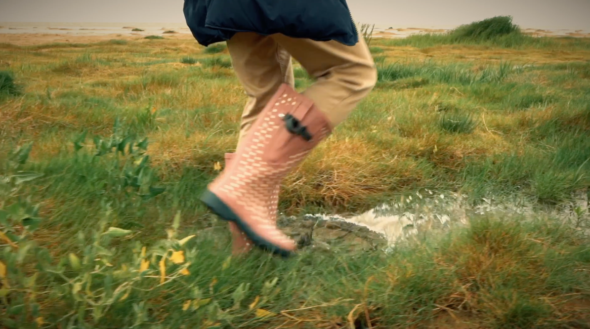 short video showing polka dot wellies in use whilst walking on marsh land